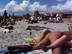 Couple having sex on the nude beach