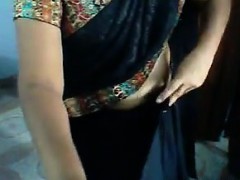 Indian Aunty Flashes And Gets Dressed