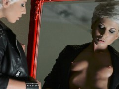 Tiffany looks hot and dangerous in her studded leather.