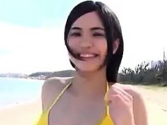 Pretty Asian Girl In A Bikini At The Beach