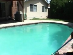 Muscle black dude jerking his cock beside the pool
