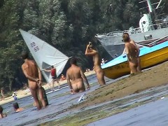 Clothing optional beach with a lot of ladies running around