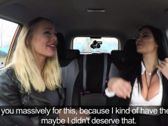 Lesbian sex in fake driving school car