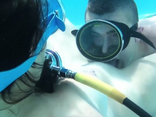 Candy being licked underwater
