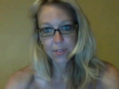 Sexy blonde nerd stripteasing and seducing on webcam at home