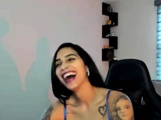 Busty babe playing with her big boobs