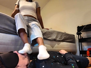 Light femdom and foot fetish play with brunette