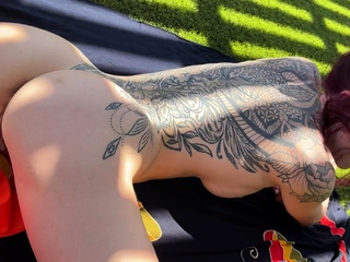 Melody masturbates outdoors with panties on