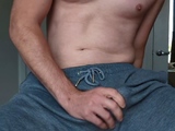 Masturbating and Cumming Through Gray Sweatpants