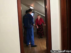 Two repairmen bang busty grandma