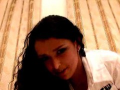 Beautiful brunette Russian seductress Julie sucking an