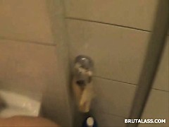 Amatuer brunette fills her ass with a big dildo and piss