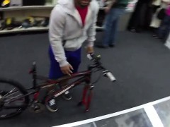 Black guy sells his bike at a pawn shop but sells more than