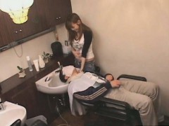 Subtitled busty Japanese stylist gives client a handjob