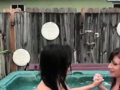 Naked teens having lesbian sex in the pool
