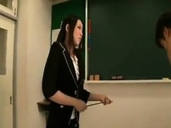 Asian Mistress With A Strap-On In Class