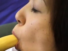 Azusa Miyanaga in school uniform sucks banana and hard penis