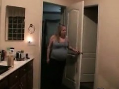 Pregnant Woman Gets In The Bath Tub