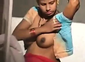 Third World Chick Washing Her Body Outside