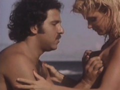 Ginger Lynn fucked on a beach by Ron Jeremy