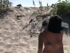 Tattooed Whore Pleasing Cocks At A Beach