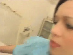 Female Doctor Examines A Cock