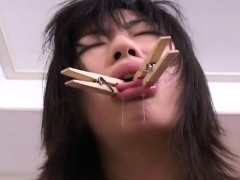 Asian brunette getting roped up and tongue pegged