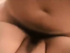 Big breasted Oriental milf pleases herself before fucking a