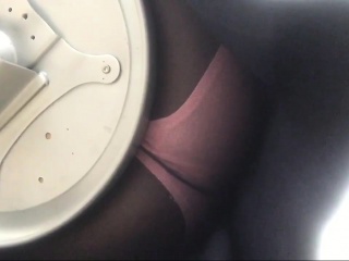 She’s sitting in a chair with nylons and no panties caught