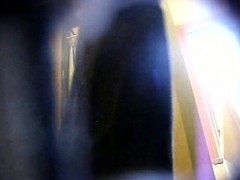 Secret changing room video of a pretty brunette with a hair