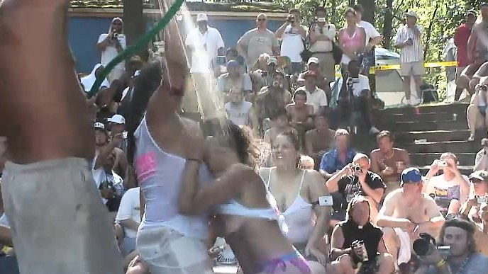 Partygoing chicks of all sizes bare their tits and asses in an outdoor wet T-shirt contest