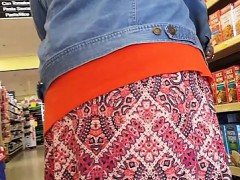 Good-looking older woman reveals her hot panties while shop