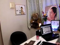 Young Asian cutie with tiny tits changes into a robe for a 