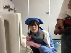 She's cleaning the urinal, sees him pee and decides to suck