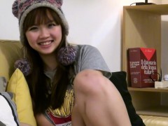 Adorable asian teen masturbates in a cute hat