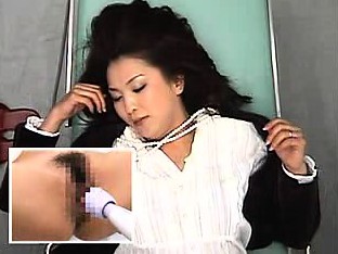 Gorgeous Asian lady spreads her legs and is made to cum by 