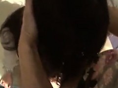Stunning Japanese lady with big tits works her mouth on a t