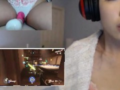 Play OVERWATCH while a dildo in her vagina