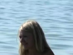 Stunning fresh-faced teenager plays in the beach naked