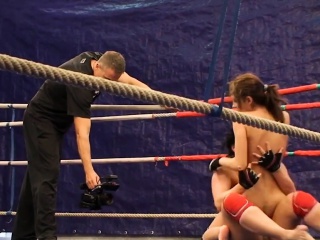 Busty babes wrestling naked in the ring