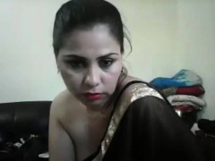 hot desi girl on cam showing boobs and teasing in a saree wi