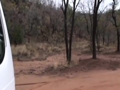 Slutty African slave giving head in car to white cock