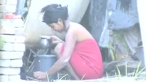 Indian Girl Washing Outdoors