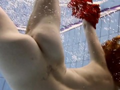 Sexy hot girl swimming in the pool