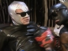 Ebony in leather butt fucked while sucking cock