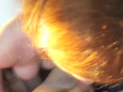 Redhead teen blowing monster cock