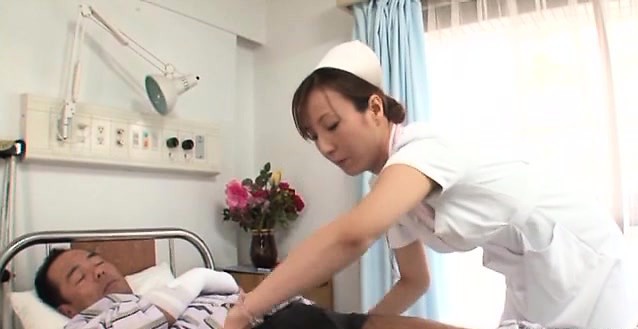 Oriental nurse deals extra big penis betwixt the lips