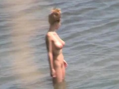 Casey Deluxe flashing boobs at a public beach