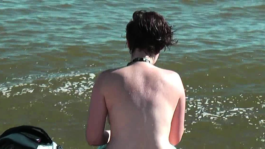 Sweatie tanned pussy at nudist beach