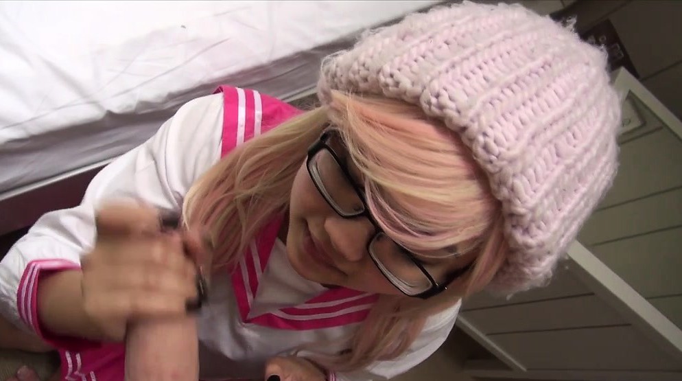 Asian schoolgirl with pink hair gives awesome blowjob